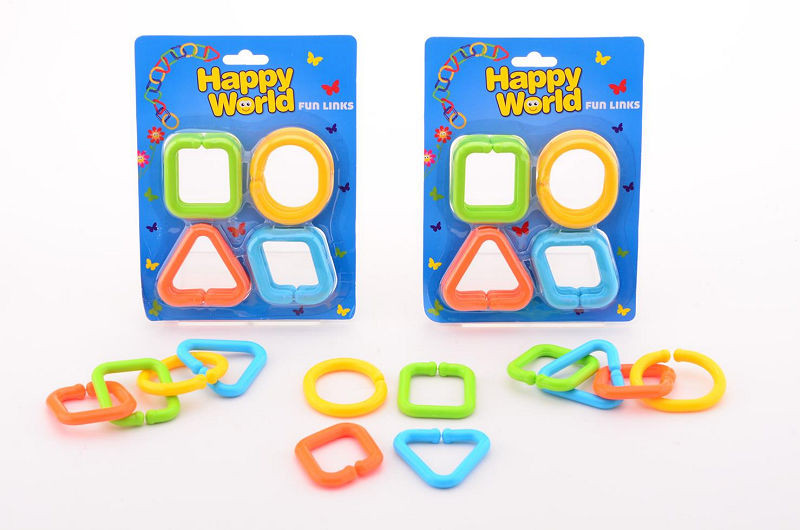 Happy World Fun en Links, Bestaat uit 12 vormen in verschillende kleuren die makkelijk van de grote ring te halen zijn.